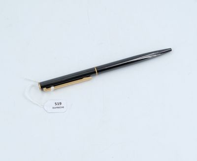 the pen is laying on a white surface with a price tag