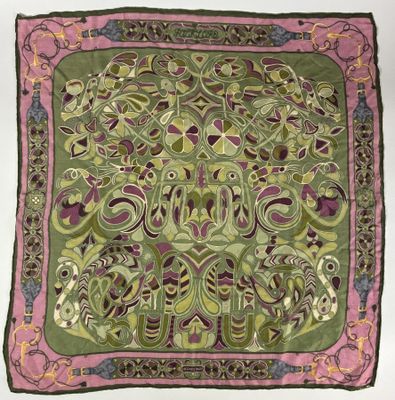 a green and pink scarf with a floral design on it