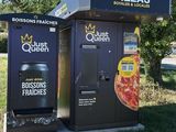 two vending machines that are on the side of the road