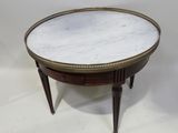 an image of a marble topped coffee table on a white background