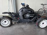 a motorcycle with a side car attached to it
