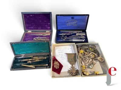 several different types of items are in a box on a white surface