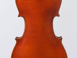 an old violin hanging from a string on a white background