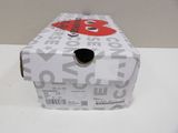 a white box with a red heart on it sitting on a table