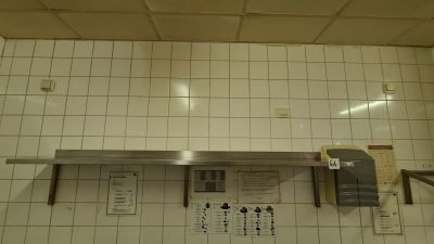 a picture of a kitchen with a stove and a sink