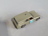a toy car that is sitting on a white surface