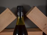 a bottle of wine that is sitting on a table