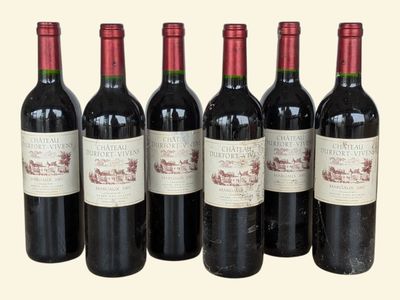 six bottles of red wine are lined up in a row