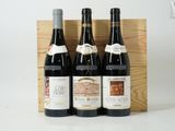 trois bouteilles de vin dans un coffret en bois