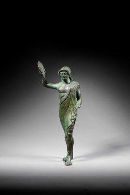 an image of a statue of a woman holding a mirror