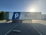 a semi truck that is parked in a parking lot