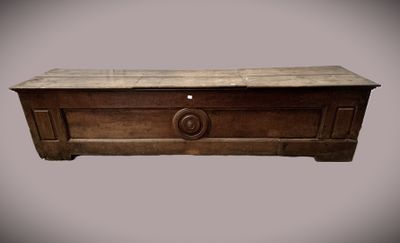 an image of a wooden chest with a door on top of it