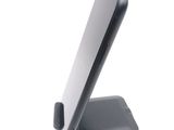 a cell phone that is sitting on top of a stand