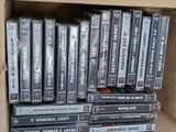 a lot of dvds in a box on a shelf