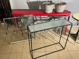 two tables with baskets on top of them in a room
