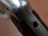 a close up view of a metal handle on a bike