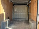 a white van that has been painted and is in the process of being remodeled