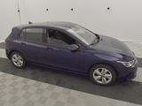a picture of a blue car parked in a garage