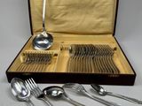 silverware in a case with spoons, forks and spoons in it