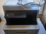 a printer that is sitting on top of a table