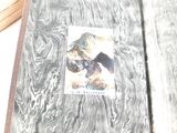 a book with a picture of a bear on it sitting on a table