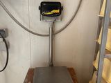 an image of a scale with cheese on it