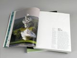 a book with a picture of a golf trophy on top of it
