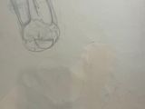 a drawing of a vase on a piece of paper