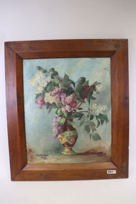 un tableau de fleurs dans un vase sur le mur