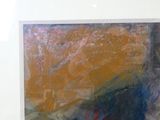 une image d'un tableau accroché au mur d'une pièce