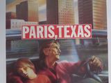 Affiche du film « Paris, Texas » représentant une femme au volant d'une voiture et un homme assis sur le siège conducteur