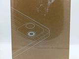 the box is open on a white surface with a picture of a cell phone in it