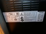 a close up of a label on the back of a hot water heater