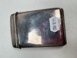 a silver case that has a tag on it