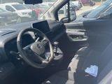the interior of a car with a steering wheel and dashboard