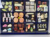 a display case with many different items in it