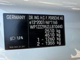a close up of a car ' s rear end with a price tag on it