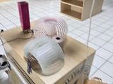 a stuffed animal sitting on top of a box in the middle of a room