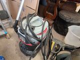 a room with a lot of clutter and tools on the floor