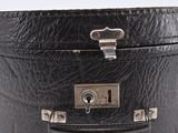 an image of a black leather belt with a lock on it