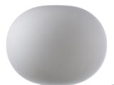 a white lamp that is sitting on a table