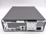 the back view of a computer with a hard drive on top of it