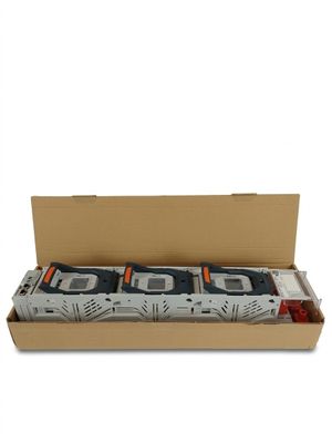 une boîte en carton contenant trois vieux téléphones portables