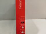 the box is red and white with a black handle on it
