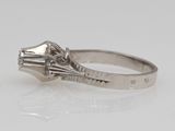 an 18k white gold and diamond ring