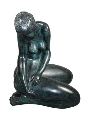 statue of a woman sitting on her knees with her hands on her knees