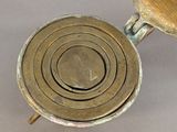 a metal object that is sitting on a table