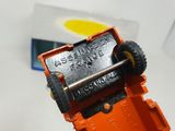 a close up of a toy car with a key on it