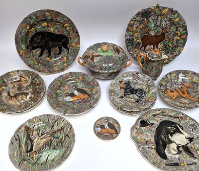 a group of plates with animals on them sitting on a table