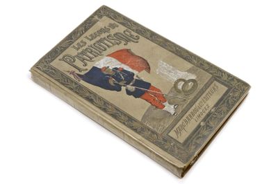 un vieux livre sur lequel figure l'image d'un homme tenant un parapluie